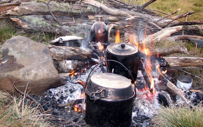 Learn how to prepare and cook safely on a campfire to prevent burns and other campfire accidents